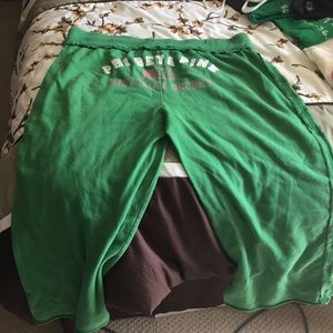 Pink distressed capris